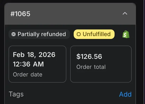 An order card in the sidebar marked partially refunded and unfulfilled, with its date and total