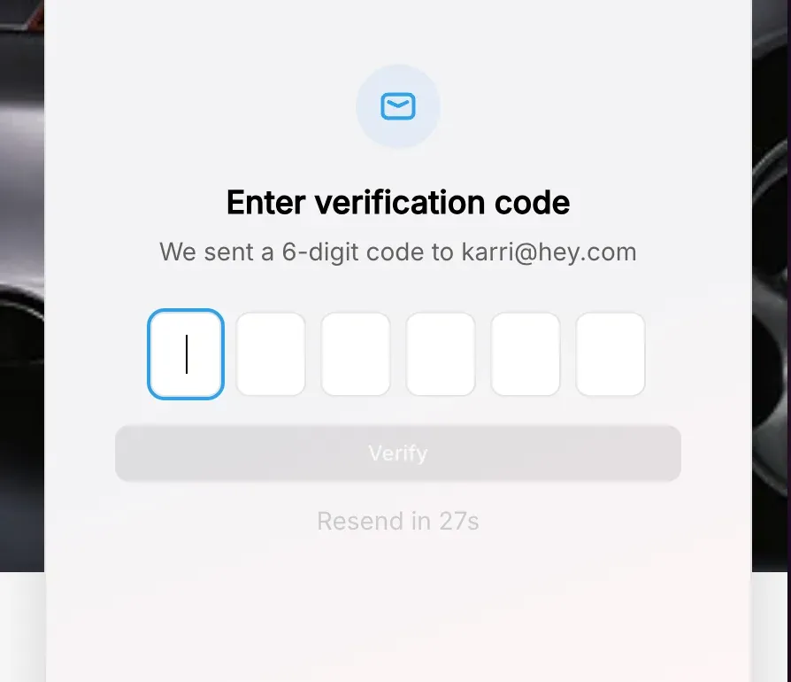 The verification step, asking for the six-digit code sent to the customer’s email before the order opens