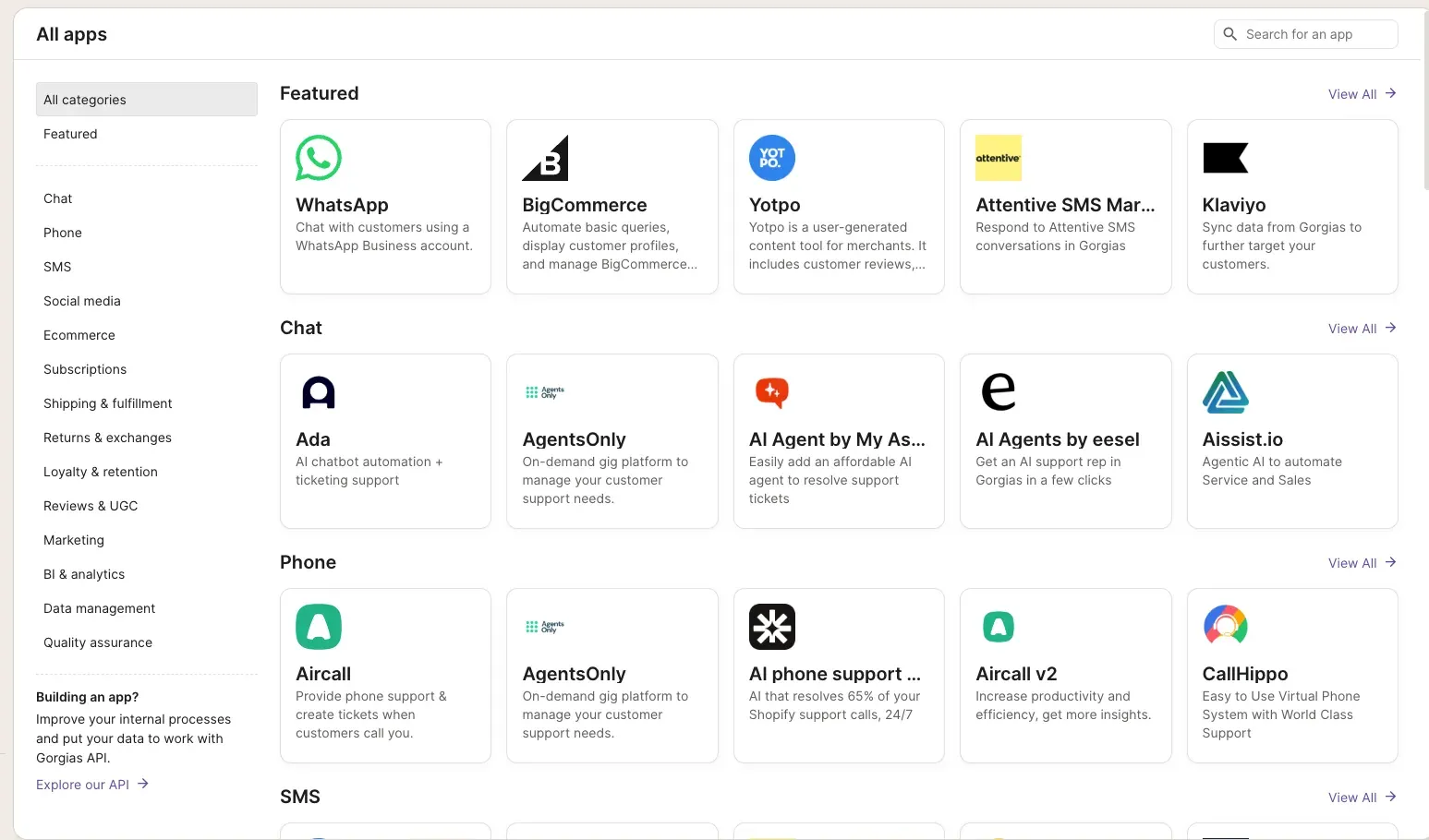 Gorgias All apps directory with a search box, category sidebar, and rows of featured, chat, and phone integrations including WhatsApp, Klaviyo, Yotpo, Ada, and Aircall